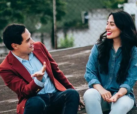 man and woman chatting