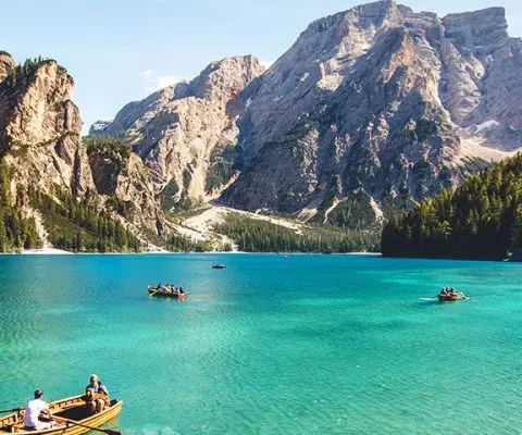 boats on water in alpine lake, Italy