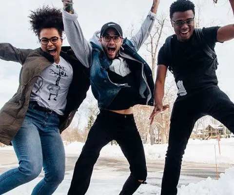 group of friends jumping