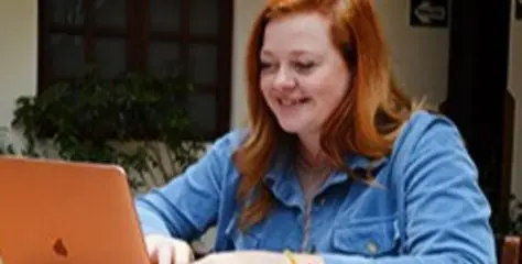 a woman taking an online tefl certification