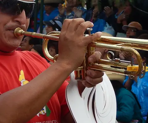 Peruvian man playing the trumpet
